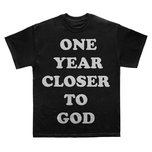 one year closer to God (tee)
